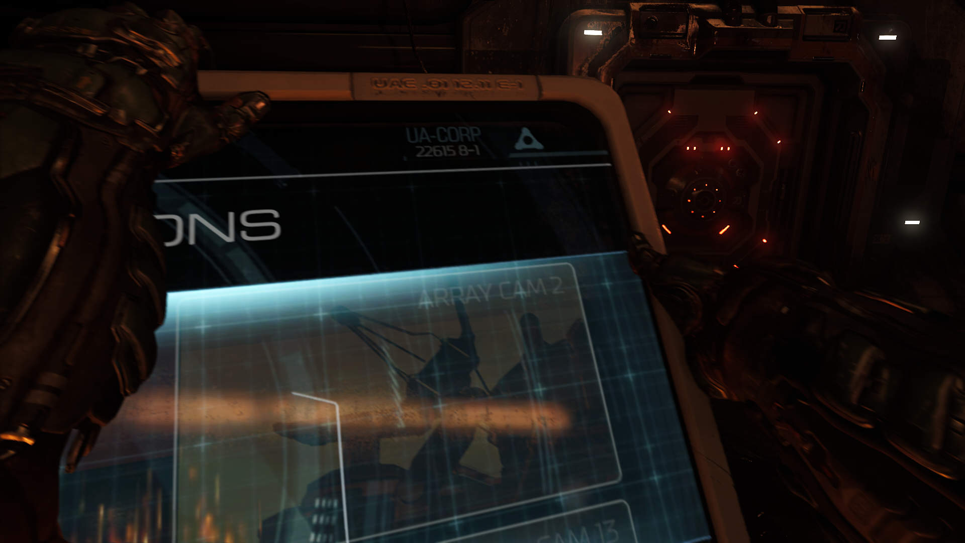 A screenshot from Doom 2016. The main character pushes a computer monitor away from them.