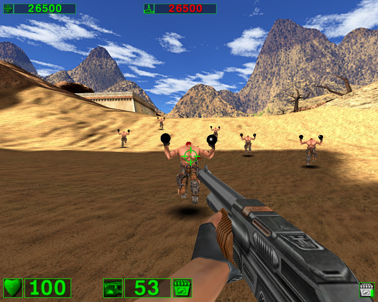 A screenshot of Serious Sam: The First Encounter. Multiple 'Headless Kamikaze' enemies charge down a sand dune towards the player. There are mountains in the distance, and the sky is a bright blue.